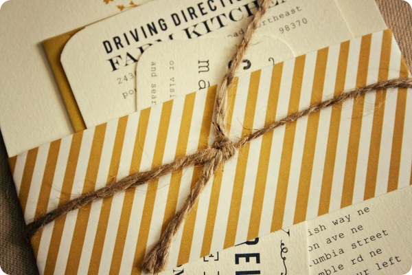 All of the invitation pieces were bundled with a striped wrap and tied with