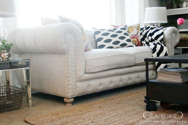 linen-sofa-with-tufting-and-nail-head-trim